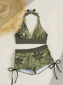 SHEIN Swim 这款女士成熟优雅度假风两件式泳衣套装，采用吊带V领上衣，饰以热带植物印花和黑色拼接，并以金色丝带点缀，搭配简约的抽绳平角泳裤。非常适合度假穿着，是春假、返校季、节假日、春季促销和海滩休闲活动的理想之选。女士夏季泳装比基尼套装，女士海滩套装，女士两件式海滩套装，Zestiva泳装，Yummy Control Ba - 彩色 - 查看 7