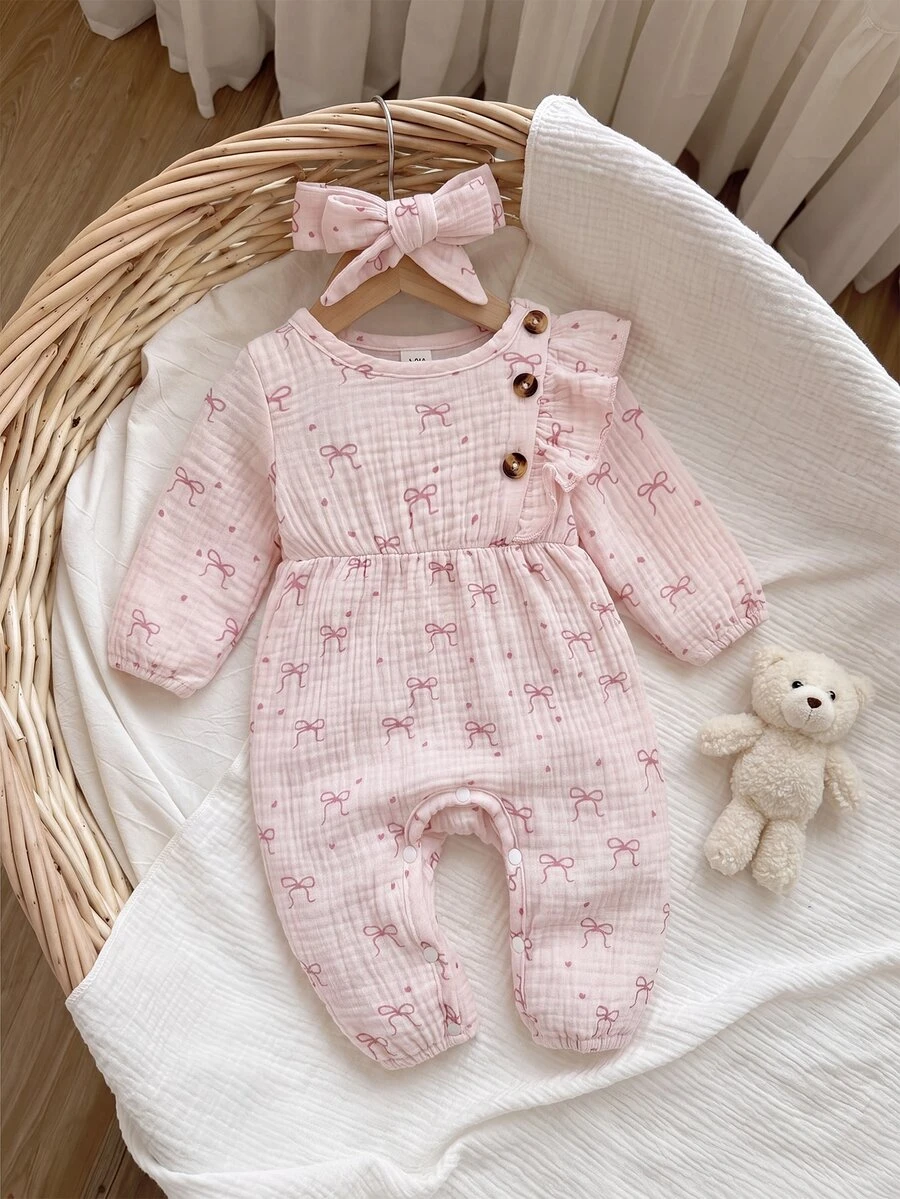 SHEIN Playful Pals 1件新生女嬰0M-6M粉色蝴蝶結印花連身衣,附荷葉邊與鈕扣裝飾,長袖輕量連身套裝,日常穿著,春秋款 - 粉色 - 查看 1