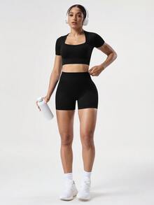 SHEIN Sports 2 件套 + 常规版型 + 吸湿排汗面料/罗纹 + 圆领/基本款/海军蓝 + 运动服套装 + 无缝/健身/瑜伽短裤紧身裤套装 骑行短裤套装 瑜伽套装 短裤 女士健身套装 - 黑色 - 查看 1