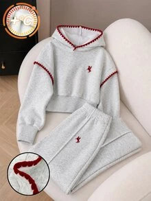 SHEIN 2件組青少年女孩灰色花卉連帽拉鍊開襟衫，寬肩落肩長版羅紋收腰時尚休閒獨特設計運動上衣，搭配同色寬鬆舒適闊腿褲套裝，休閒運動學院風，適合戶外、室內、運動、派對、學校及任何場合穿著，春秋冬季適用 - 淺灰色 - 查看 1
