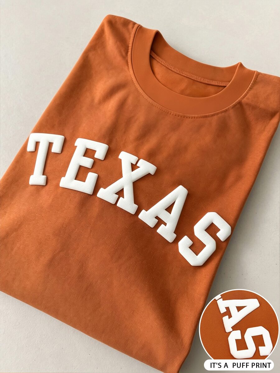 SHEIN 男女通用 TEXAS 印花短袖插肩 T 恤,女士圆领彩色图案 T 恤 - 鏽棕色 - 查看 1