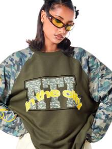 SUMWON WOMEN Oversized Waffle Knit Long Sleeve Top With Camo Raglan Sleeves And Graphic Text Print Front - Khaki - View 5