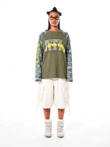 SUMWON WOMEN Oversized Waffle Knit Long Sleeve Top With Camo Raglan Sleeves And Graphic Text Print Front - Khaki - View 3