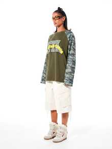 SUMWON WOMEN Oversized Waffle Knit Long Sleeve Top With Camo Raglan Sleeves And Graphic Text Print Front - Khaki - View 4