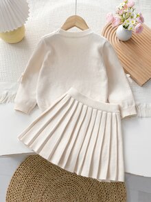 SHEIN Playful Pals 4-7歲女童粉色3D蝴蝶結圓領針織毛衣與百褶裙2件套，兒童幼兒園日常出遊生日拍照套裝，春夏秋冬款 - 杏色 - 查看 2