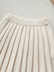 SHEIN Playful Pals 4-7歲女童粉色3D蝴蝶結圓領針織毛衣與百褶裙2件套，兒童幼兒園日常出遊生日拍照套裝，春夏秋冬款 - 杏色 - 查看 7