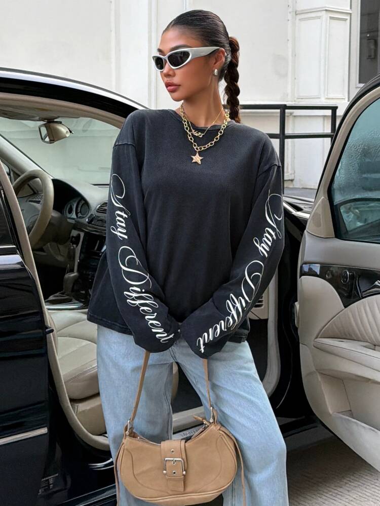 Muchica Women's Black Washed Long Sleeve Graphic Tee, Oversized Script Print Streetwear T-Shirt, Vintage Y2K Casual Top For Fall Concert And Everyday Outfits - Black - View 1