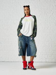SUMWON WOMEN Oversized Camo Raglan Long Sleeve Top With Red Ringer Neckline And Mesh Sleeves Featuring Script Chest Logo Print - Multicolor - View 2