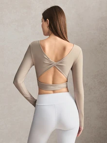 Activina Women's Solid Color Back Cutout Twist Design Long Sleeve Cropped Sports T-Shirt - Beige - View 1