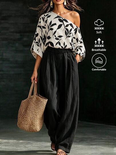 SHEIN LUNE Conjunto de estilo bohemio elegante para vacaciones de mujer, top con cuello asimétrico, estampado de hojas y mangas farol + pantalones de pierna ancha, casual de 2 piezas en beige y negro para otoño