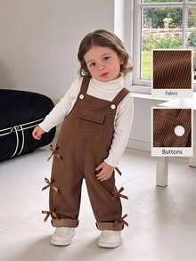 SHEIN Vintaside Kids 女嬰燈芯絨吊帶褲，四季適用，可愛風格，咖啡棕色配棕色蝴蝶結裝飾，胸前口袋設計，寬鬆直筒連身褲，柔軟舒適，適合上學、通勤、日常外出 - 咖啡棕 - 查看 2