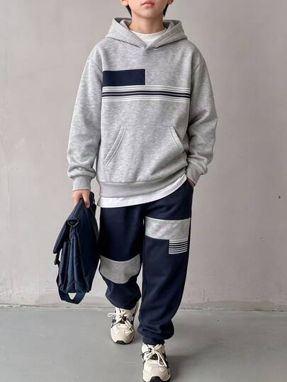 SHEIN Conjunto de 2 piezas de sudadera con capucha y pantalones de chándal para niños, sudadera con capucha de bloques de color gris y azul marino con bolsillos y pantalones de chándal con puños, atuendo deportivo casual para adolescentes, forro térmico, ropa para niños para uso al aire libre