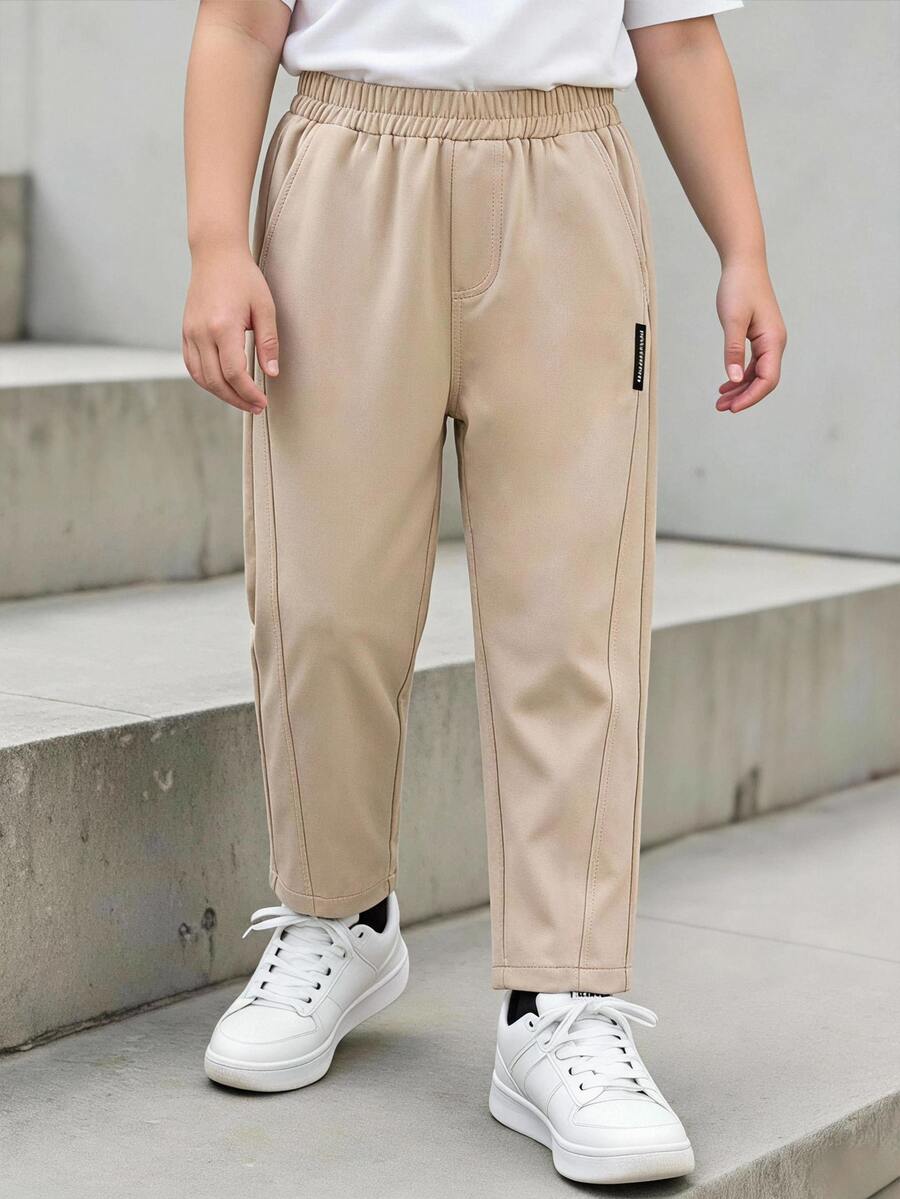 Souflis Souflis Young Boy Casual Comfortable Solid Color Long Pants With Slanted Pockets, Simple Elastic Waist Design, Suitable For Daily Wear, Travel, Party, Holiday, Versatile Fashion Outfit - Khaki - View 1