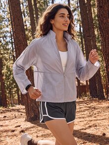 Exploreva Women's Simple Versatile Pocket Zipper Long Sleeve Sun Protection Jacket - Mauve Purple - View 1