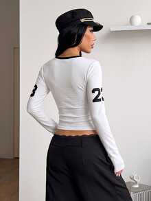Coolane Women's Fall Sporty Y2K Chic White-And-Black Slim Fit Deep V-Neck Graphic Lettering Contrast Trim Cropped Long Sleeve Polyester T-Shirt - White - View 6