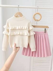 SHEIN Genkimix Kids 這是一套可愛、休閒且時尚的兩件套，包含一件白色圓領雙層蕾絲長袖毛衣和一件粉色百褶裙。材質柔軟舒適，適合日常生活、學校、外出、旅行、度假、托兒所以及兒童遊戲等多種場合，特別適合秋冬季節與節日氛圍 - 彩色 - 查看 9