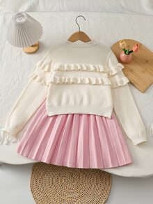 SHEIN Genkimix Kids 這是一套可愛、休閒且時尚的兩件套，包含一件白色圓領雙層蕾絲長袖毛衣和一件粉色百褶裙。材質柔軟舒適，適合日常生活、學校、外出、旅行、度假、托兒所以及兒童遊戲等多種場合，特別適合秋冬季節與節日氛圍 - 彩色 - 查看 2