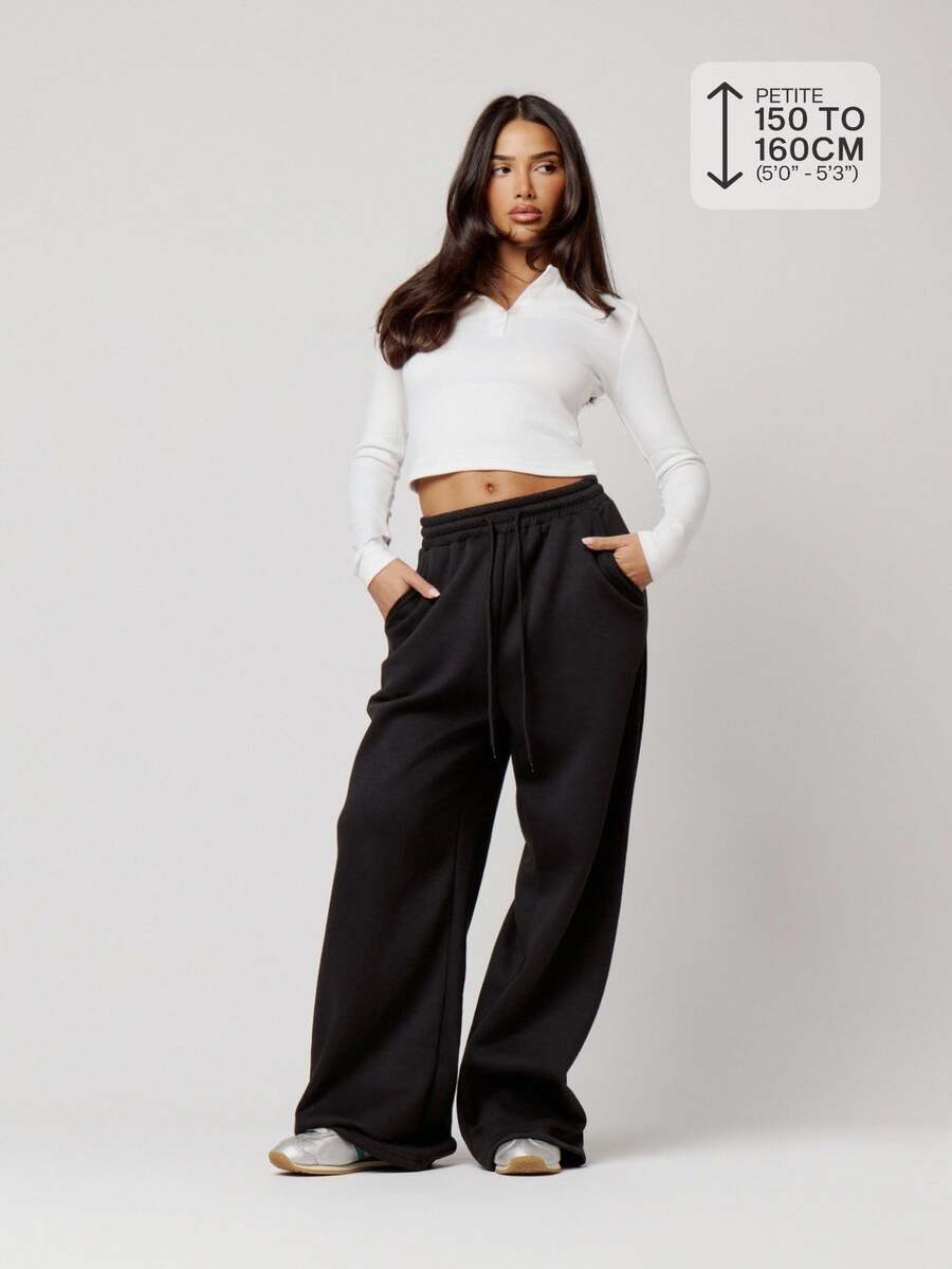 Musera Petite بنطال رياضي أسود بتفاصيل جيب وخصر مطاطي وساق واسعة للخريف والشتاء والعودة للمدرسة والاستخدام اليومي - الأسود - مشاهدة 1