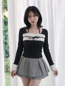 FRIFUL 女款蝴蝶結裝飾對比色長袖時尚可愛T恤，秋季日常約會穿搭，黑白配色可愛風 - 黑色 - 查看 3