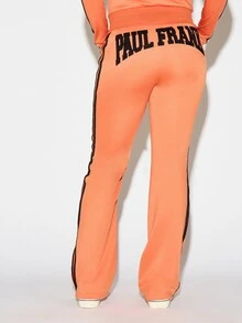 SUMWON X PAUL FRANK SUMWON WOMEN Winter Essentials California Flared Jogger Pants With Bold Logo Applique Back Print And Contrast Side Stripe Detail Autumn Warm Cozy - Orange - View 2
