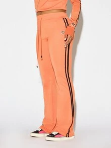 SUMWON X PAUL FRANK SUMWON WOMEN Winter Essentials California Flared Jogger Pants With Bold Logo Applique Back Print And Contrast Side Stripe Detail Autumn Warm Cozy - Orange - View 4