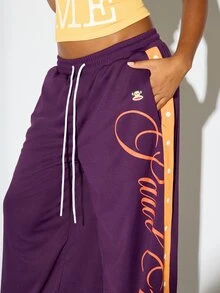 SUMWON X PAUL FRANK SUMWON WOMEN Monkey Wide Leg Jogger Pants With Cursive Logo Leg Print And Contrast Side Stripe Perfect For Spring Street Style - Purple - View 4