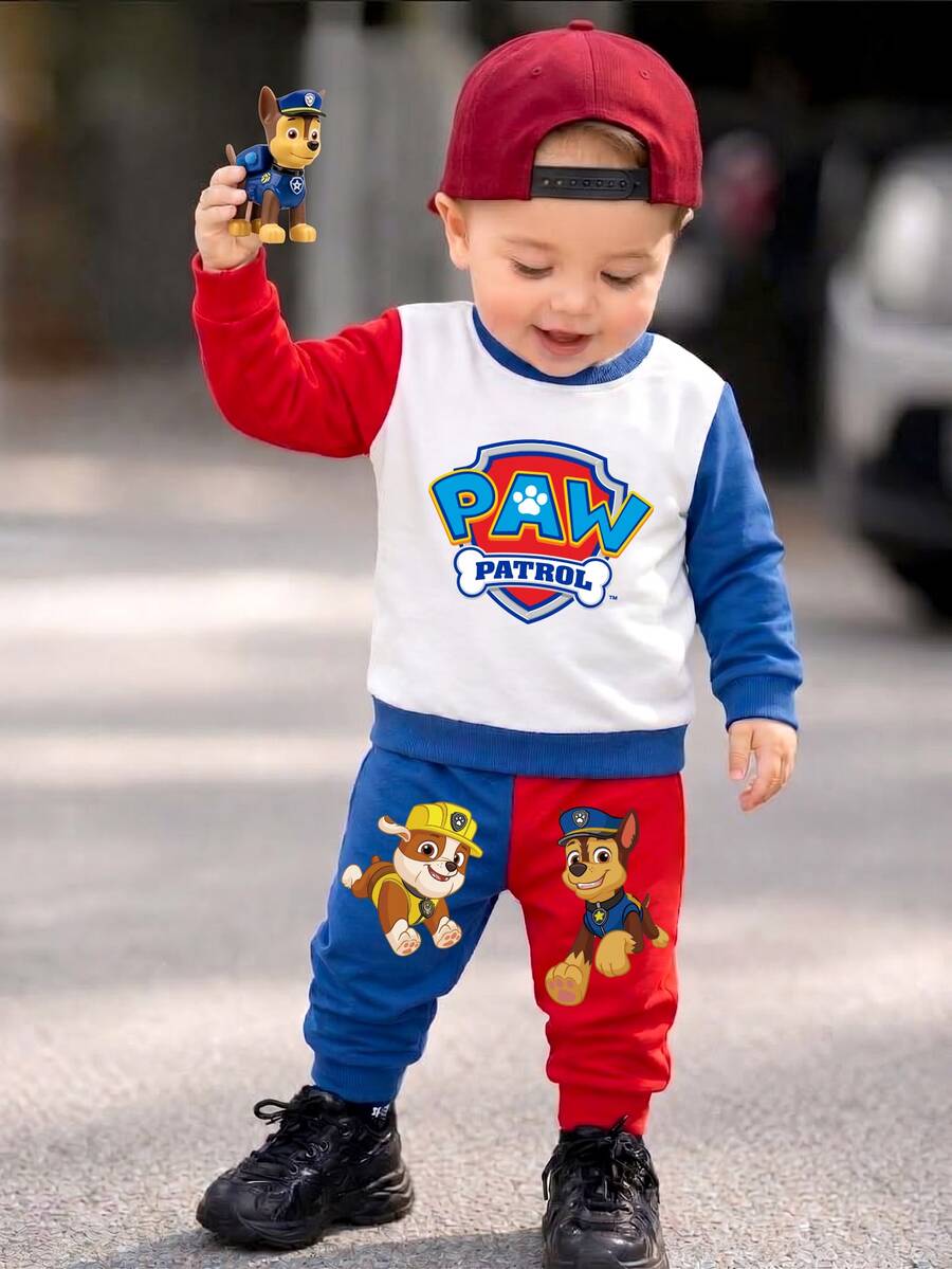SHEIN | PAW Patrol ملابس كاجوال يومية للأطفال الذكور: سويتشيرت بأكمام طويلة وطباعة كرتونية بألوان متباينة + بنطلون رياضي بخصر مطاطي وأساور بألوان متباينة مع نمط Little Pebble & Archie - الأزرق - مشاهدة 1