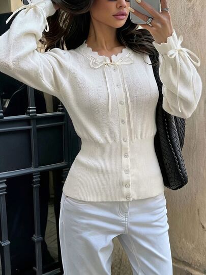SHEIN Cardigan branco casual para mulher, corte regular, manga comprida, com laço à frente e ombros, para outono/inverno, para deslocações diárias e saídas, cor lisa, roupa feminina de outono/inverno