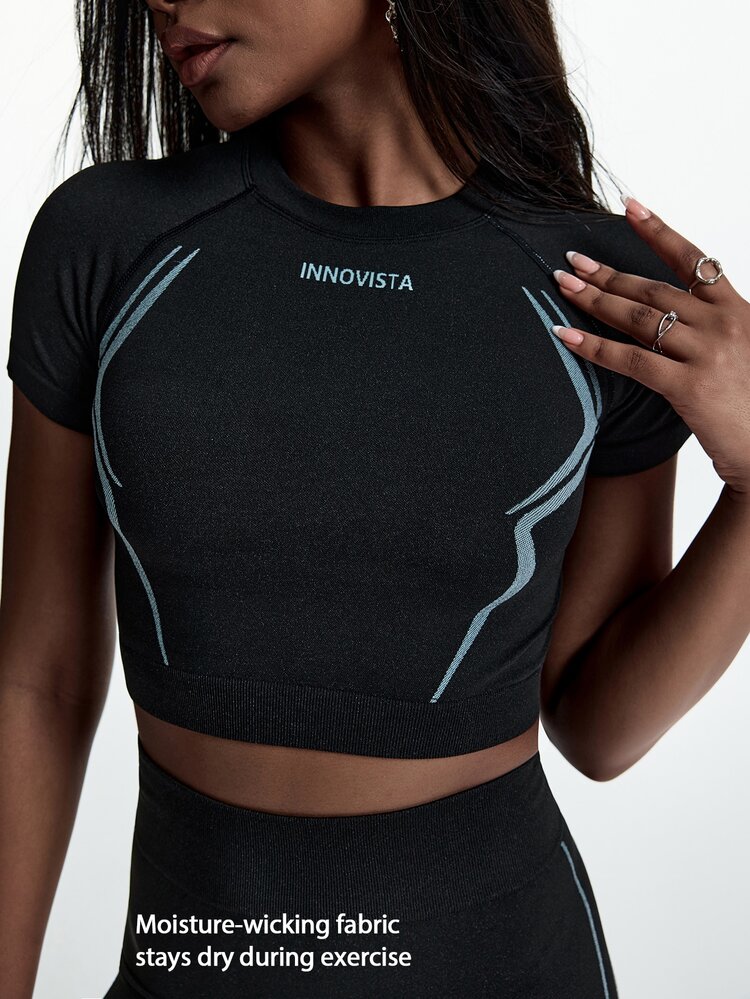 Innovista Innovista طقم رياضي نسائي بدون خياطة مكون من تي شيرت قصير وسروال ضيق، مناسب للتمرين والجيم والرياضة، يرفع المؤخرة ومقاوم للشفافية عند القرفصاء، عالي المرونة لليوغا والجري - الأسود - مشاهدة 6
