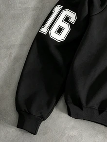 STYNVO Men's Half-Zip Pullover Sweatshirt, Black Sweatshirt With Stand Collar, American Flag And Contrast Letter Badge Prints, Loose Drop Shoulder Short Fit, - Black - View 4