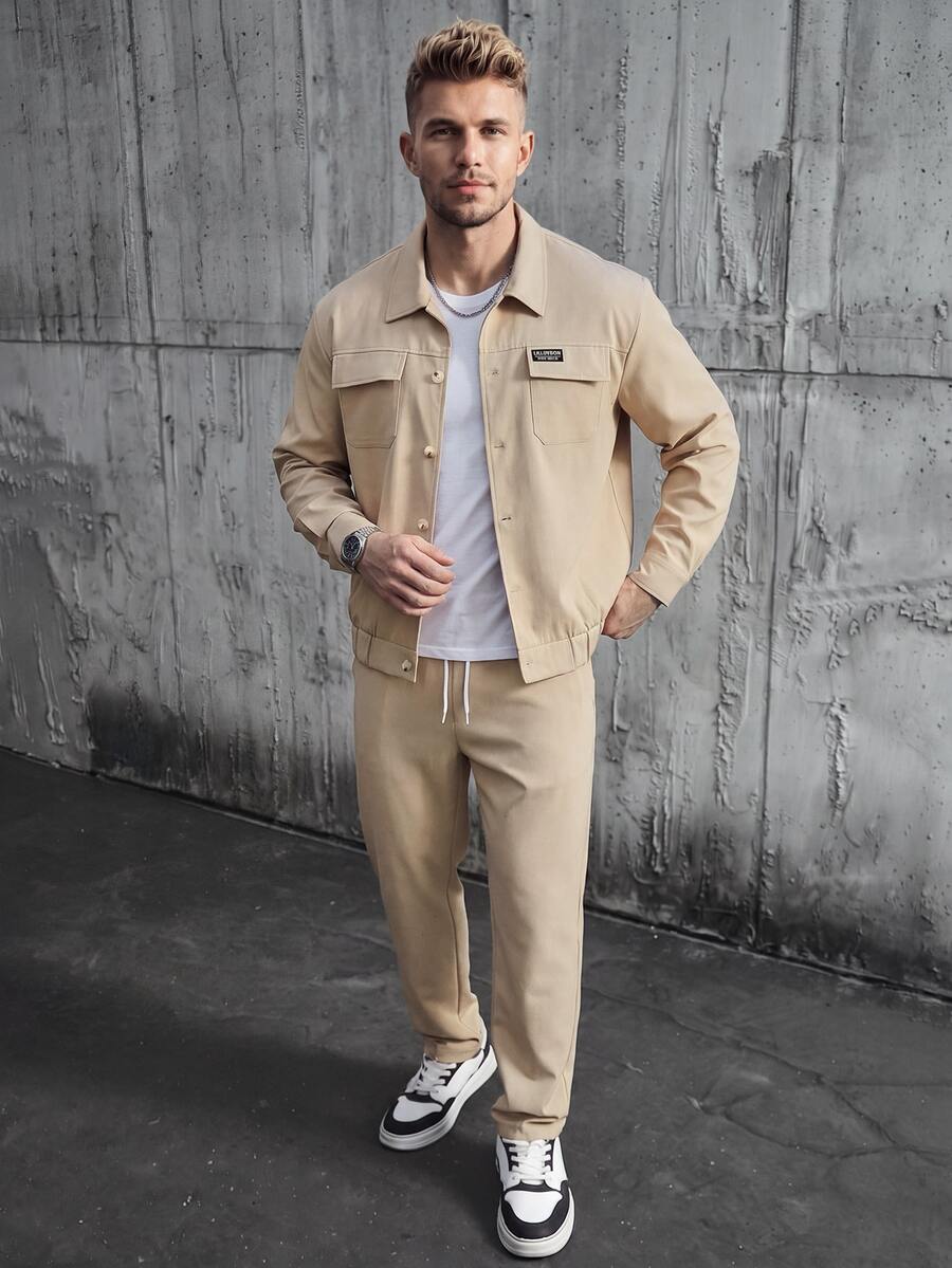 Manfinity CasualCool 男士四季高品質熱銷斜紋舒適素色布料,經典長袖雙口袋夾克 + 抽繩鬆緊腰長褲,休閒度假、極簡辦公、好友約會、聚會、宴會,適合正式或非正式場合,極簡熱銷百搭風格,適合自穿或送禮給朋友 - 卡其色 - 查看 1