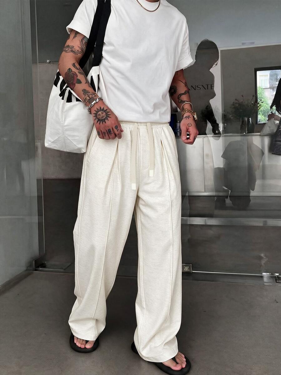 STEELVANCE Men's Solid Color Drawstring Waist Pleated Straight Leg Casual Pants, Loose Fit Minimalist Streetwear Trousers - White - View 1