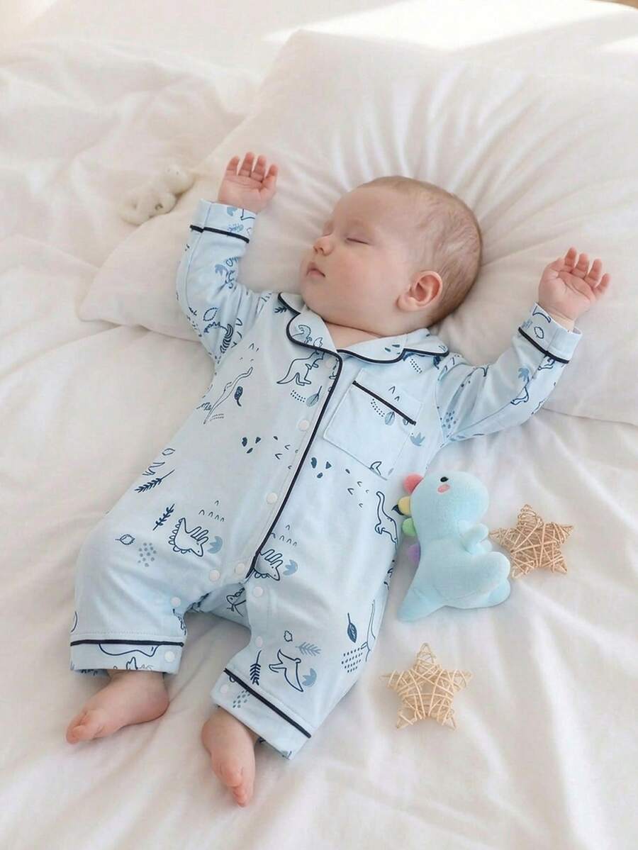 SHEIN Vintaside Kids Newborn Baby Autumn/Winter One-Piece Pajamas, Cartoon Dinosaur Print Pattern, Drawstring Trim Fabric, Long Sleeve Round Neck Button Pants