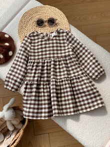 SHEIN 女嬰格紋彼得潘領長袖連身裙，附蝴蝶結與荷葉邊，休閒幼兒套裝，棕色格紋配粉色荷葉領，甜美蝴蝶結細節，時尚幼兒女孩格紋長袖連身裙，適合日常穿著 - 咖啡棕 - 查看 5