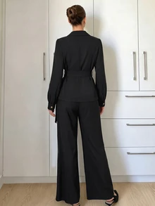 Modelyn Women's Black Suit Set: Elegant Notched-Collar Jacket With Asymmetric Pleated Hem And Matching Trousers – Fall/ Social Work Office Dinner Outfits - Black - View 3