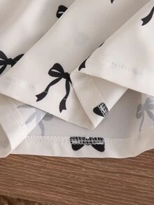 SHEIN 幼兒女嬰時尚可愛羅紋針織蝴蝶結印花荷葉袖柔軟黑白格紋洋裝 太陽裙 適合上學、生日派對、夏季 - 黑色 - 查看 7