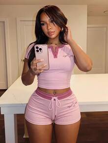 Slaydiva New Summer Casual Cute Street Style Slim Fit Light Pink Round Neck Half-Open Printed Letter T-Shirt + Mini Shorts Women Two Pieces Set. Lounge Styles - Pink - View 1