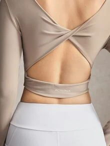 Activina Women's Solid Color Back Cutout Twist Design Long Sleeve Cropped Sports T-Shirt - Beige - View 3