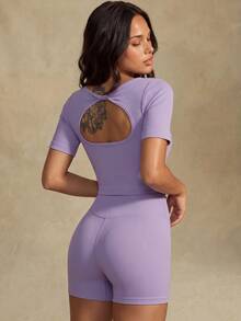 Nuvra Women's Seamless Twisted Hollow Back Ribbed Cropped Top, Tight Fit Yoga Sporty Athleisure Knit Short Sleeve Gym Workout Purple Summer - Purple - View 1
