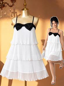Rometta Plus Size Women's Spaghetti Strap Dress With Triple Layer Pleated Design And Prominent Black Bow On The Chest - White - View 9