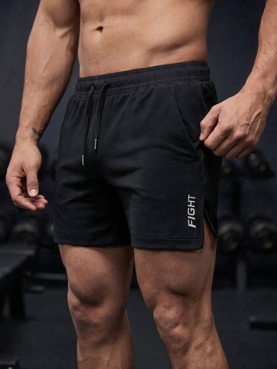 GymBeat Boyfriend Style Men Letter Graphic Drawstring Waist Split Hem Sports Stretchy Shorts Gym Shorts, Lightweight - Black - View 1