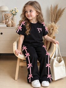 SHEIN Elladie kids 女童可爱粉色蝴蝶结印花圆领短袖T恤搭配黑色长裤时尚套装，春夏款 - 黑色 - 查看 1