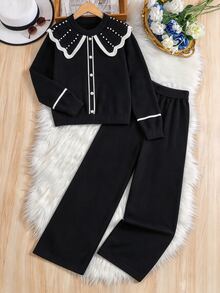 少女黑色毛衣套装 - 甜美风格，饰有厚重荷叶边领、宽翻领和3D珍珠点缀。宽松百搭的优雅针织两件套（长袖开衫+长裤），设计温柔时尚。适合日常穿着、节日庆典、外出、旅行、度假、居家穿着以及返校造型，细节丰富，百搭实用。 - 黑色 - 查看 3