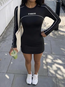 StreetHx Women's 2 Pieces Sports Set: Black Round Neck Long Sleeve Split Hem Workout Dress And High-Waisted Sports Shorts With Phone Pocket - Black - View 4