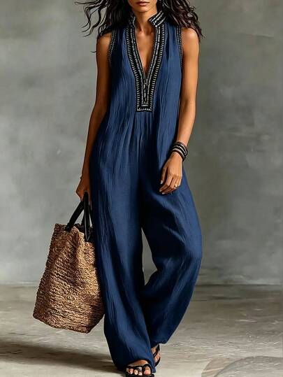 SHEIN Franclia [تصميم مطبوع] جمبسوت نسائي بدون أكمام، أزرق داكن، جمبسوت بوهيمي كاجوال صيفي، إجازة، عطلة، بنطال واسع الساق بطبعة زهور، قماش أنيق مريح، أسلوب شاطئي أنيق