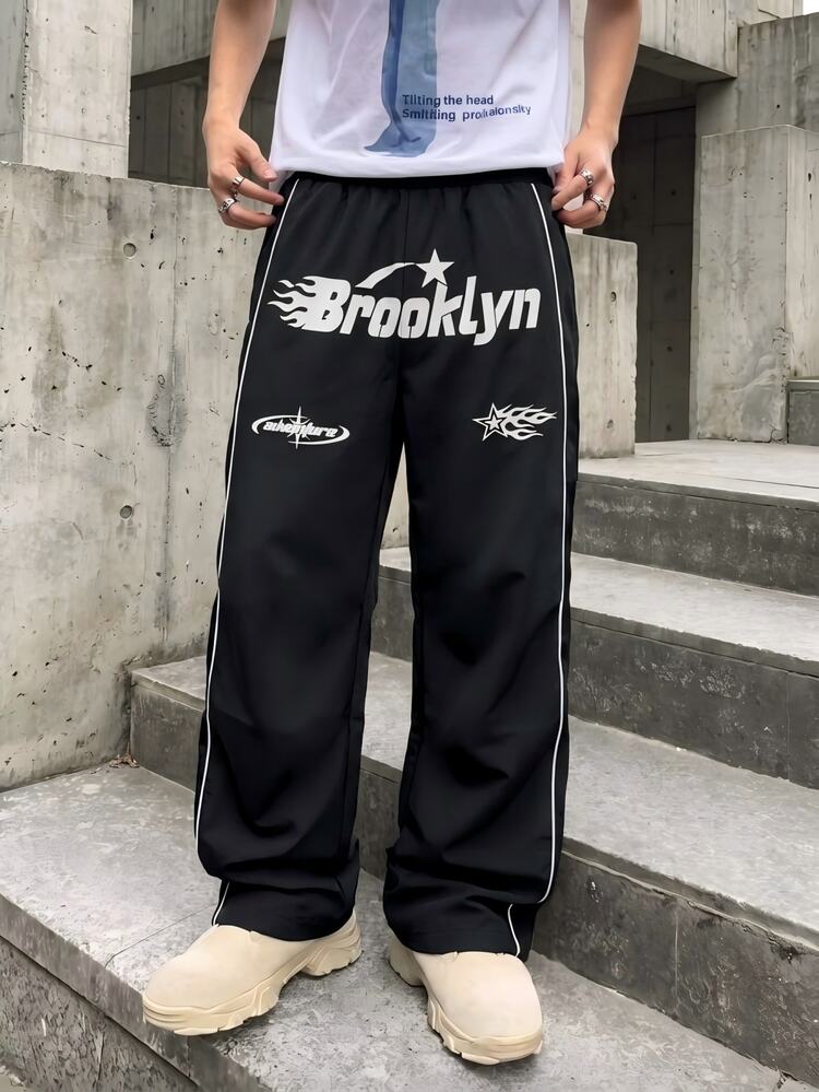 Teen Boy High Street Loose Wide Leg Sweatpants , Black Track Pants Flame Star Graphic Print Trousers For Fall Style School Wearing - Black - View 1