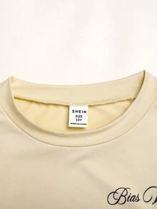SHEIN طقم كاجوال من قطعتين للبنات المراهقات الصغيرات، تي شيرت بطبعة حروف وياقة دائرية وأكمام طويلة مع بنطال واسع الساق - لون مشمشي - مشاهدة 5