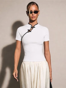 COSMINA Women's Casual Elegant Contrast Color Frog Button Knit Top - White - View 1