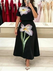 Modelyn Women's Plus Size Fashion Knit Elastic Short Sleeve Round Neck Sweater And Elegant 3D Floral Skirt 2-Piece Set, Suitable For Banquet, Outing, Party - Black - View 2