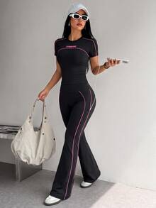 Dewbera Dewbera Women's Black & White Fitted Short Sleeve Crew Neck Sports T-Shirt And Flared Leg Sports Pants Set - Black - View 2